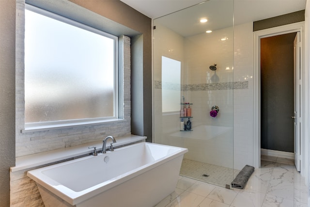 bathroom with independent shower and bath