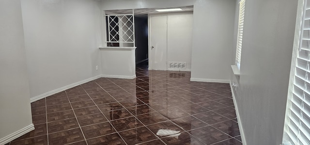 view of tiled spare room