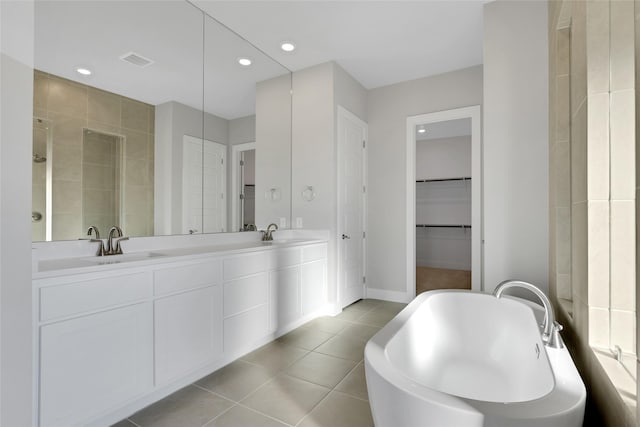 bathroom featuring tile patterned floors and vanity