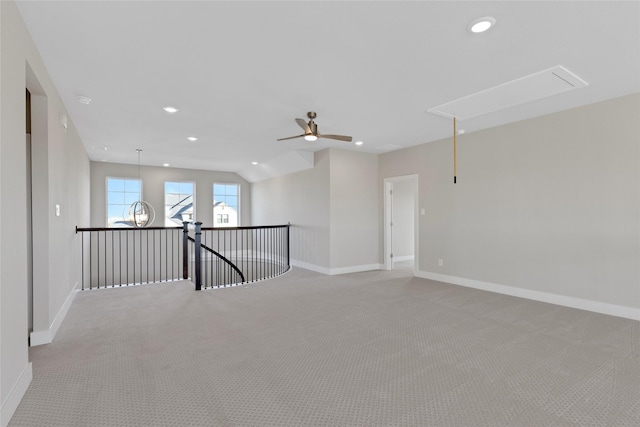 carpeted empty room with ceiling fan