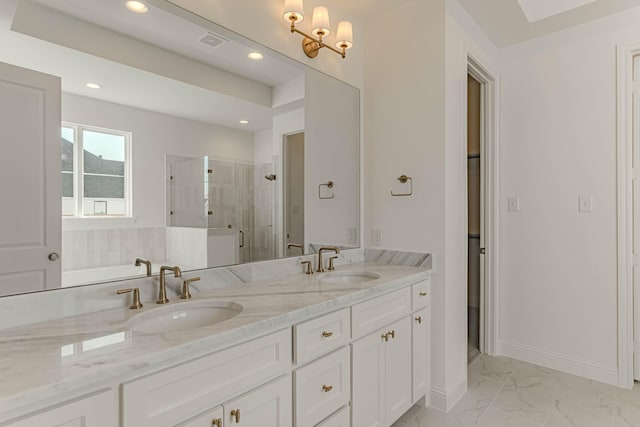 bathroom with vanity and an enclosed shower