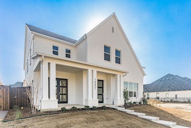 view of front of house featuring a mountain view and a porch