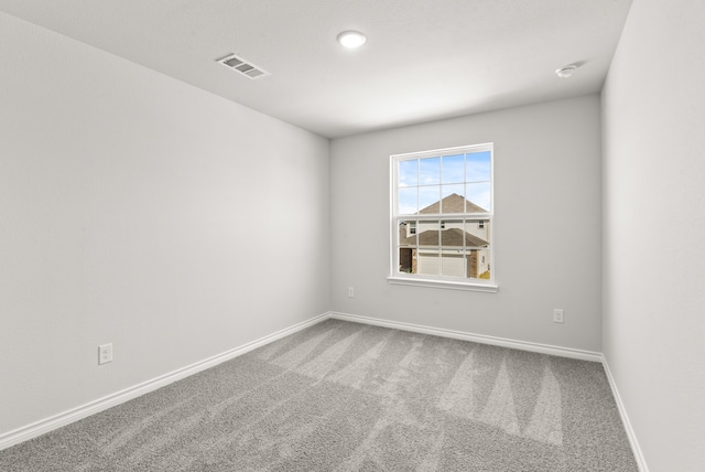 view of carpeted spare room