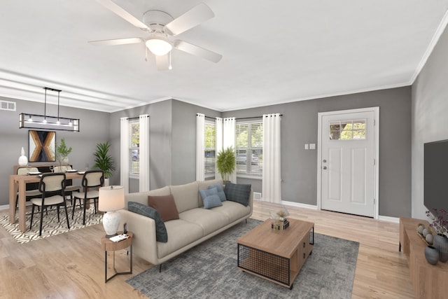 entryway featuring crown molding, light hardwood / wood-style flooring, and ceiling fan