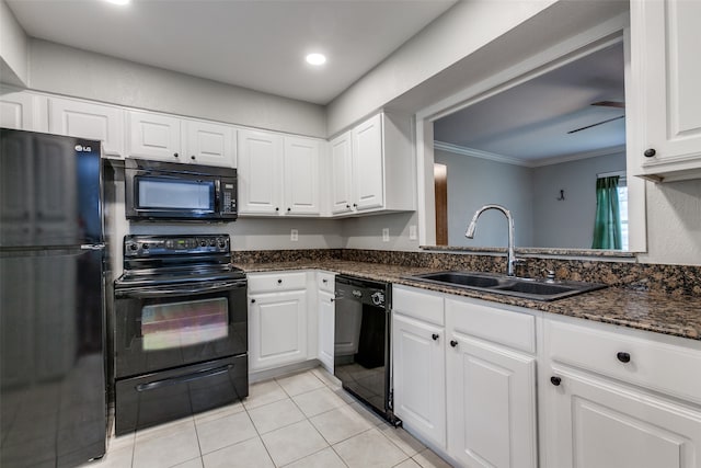 kitchen with sink, white cabinetry, black appliances, crown molding, and dark stone countertops