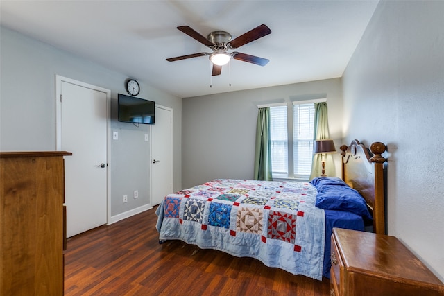 bedroom featuring ceiling fan and dark wood-type flooring