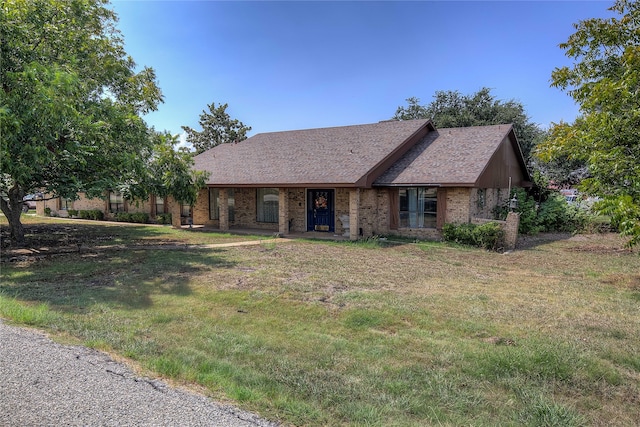 view of front of property with a front lawn