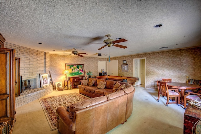 living room with ceiling fan, light colored carpet, a textured ceiling, and billiards