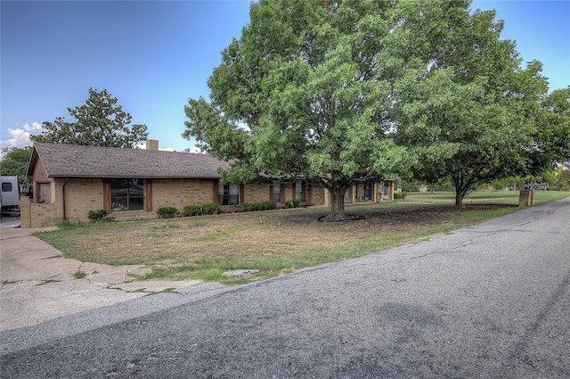 view of front of home with a front yard