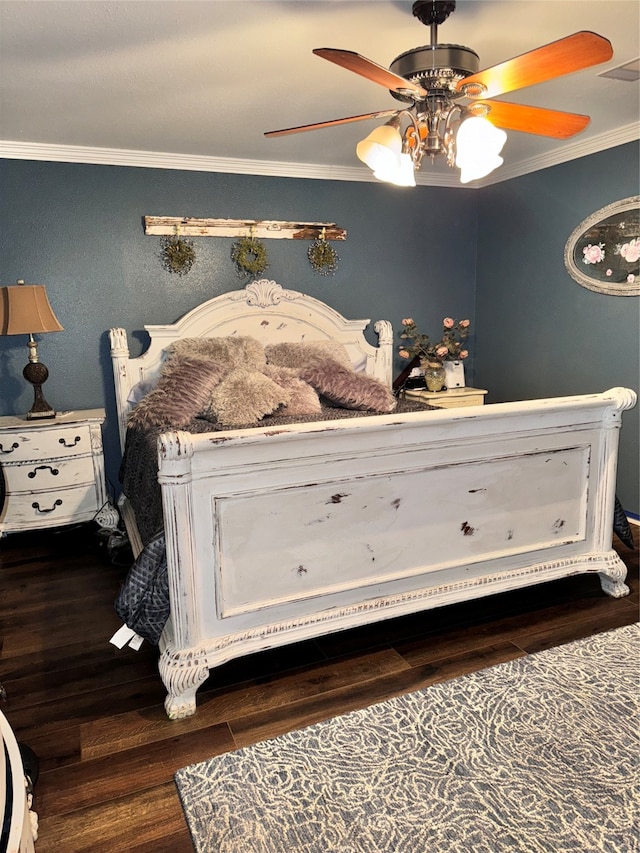 bedroom featuring crown molding, dark hardwood / wood-style floors, and ceiling fan