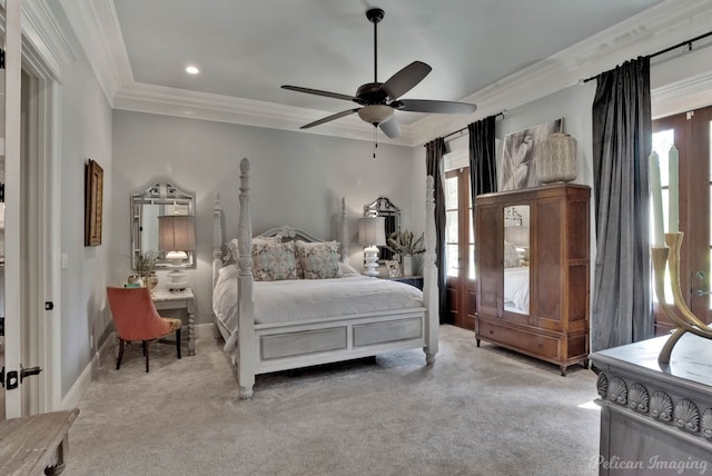 carpeted bedroom with crown molding and ceiling fan