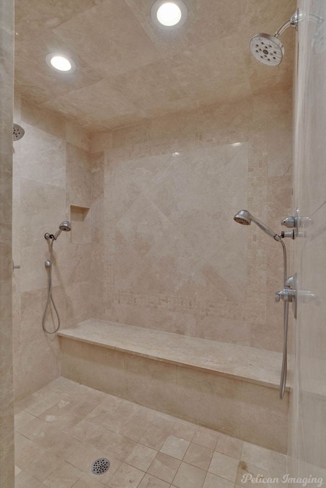 bathroom featuring tiled shower