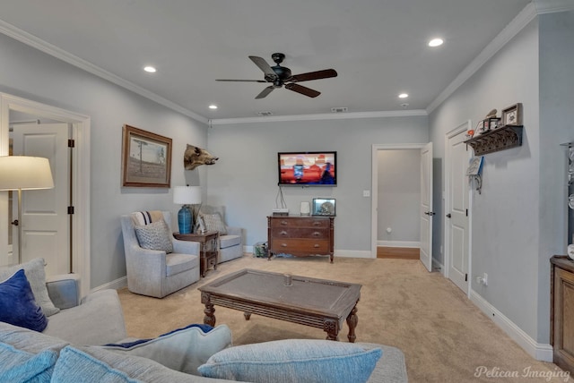 carpeted living room featuring ornamental molding and ceiling fan