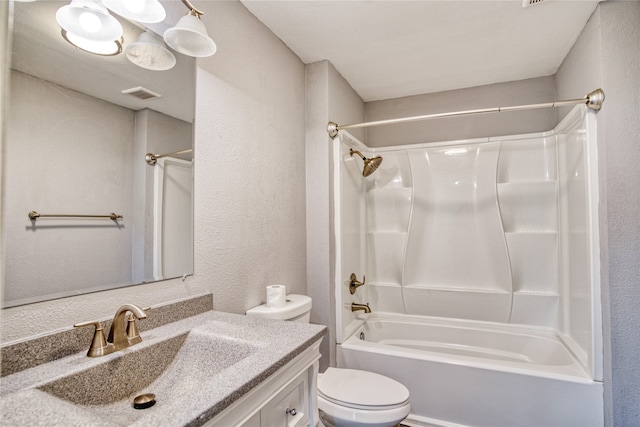 full bathroom featuring vanity, toilet, and  shower combination