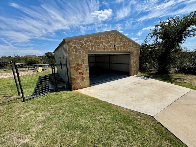 garage with a lawn