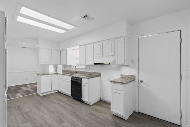 kitchen with light wood-type flooring, dishwasher, white cabinetry, and sink