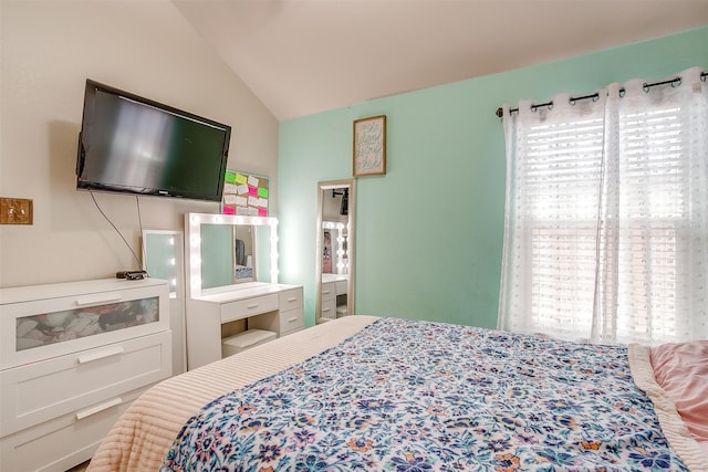 bedroom with vaulted ceiling