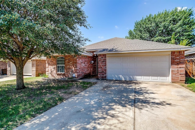 single story home with a garage