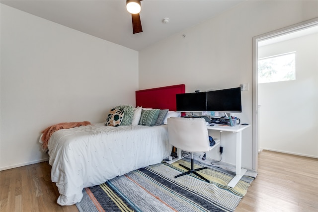 bedroom featuring light hardwood / wood-style flooring and ceiling fan