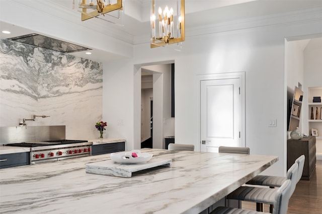 dining space featuring a chandelier, a towering ceiling, crown molding, and dark wood-type flooring