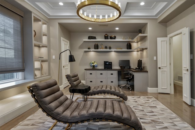 sitting room featuring light hardwood / wood-style flooring, a notable chandelier, and crown molding