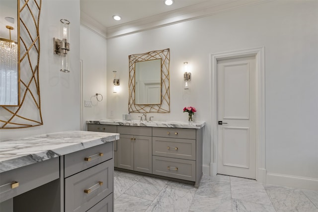 bathroom with vanity and ornamental molding