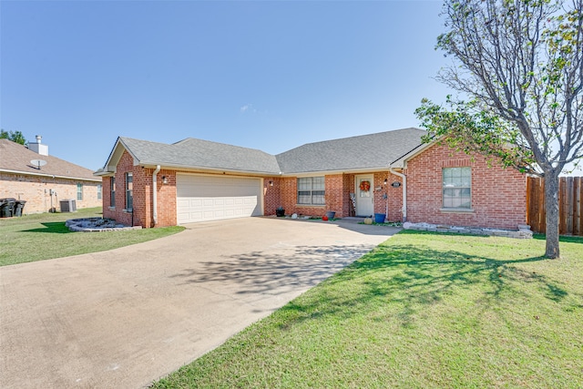 ranch-style house with central AC, a garage, and a front lawn