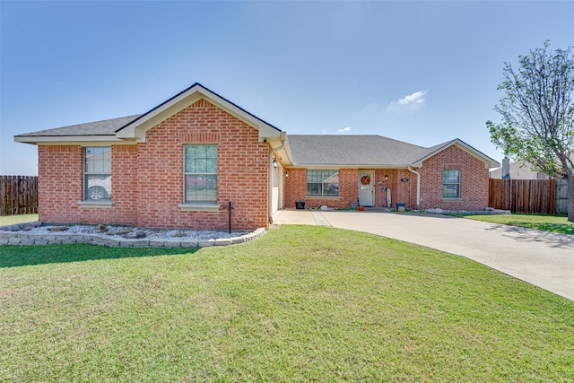 ranch-style house with a front yard