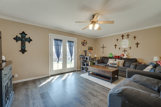 living room featuring ceiling fan, french doors, ornamental molding, and light hardwood / wood-style flooring