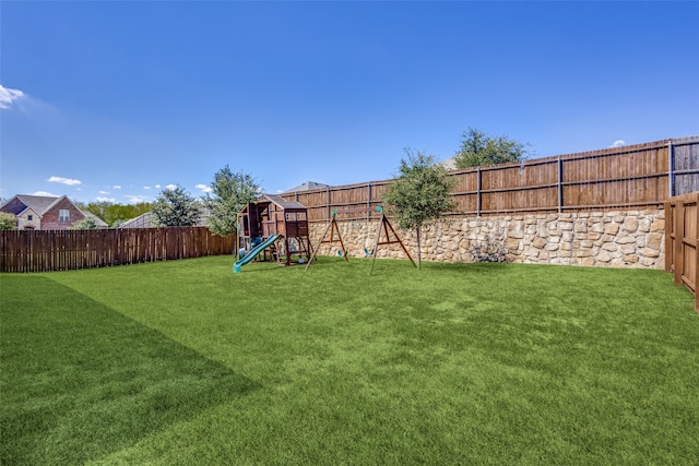 view of yard featuring a playground