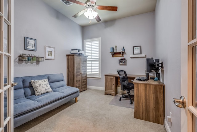 office with ceiling fan, light colored carpet, and french doors