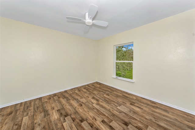 empty room featuring ceiling fan and wood-type flooring