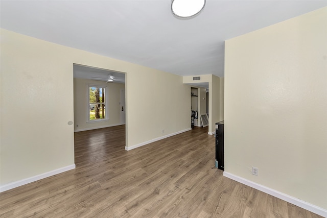 empty room with light wood-type flooring