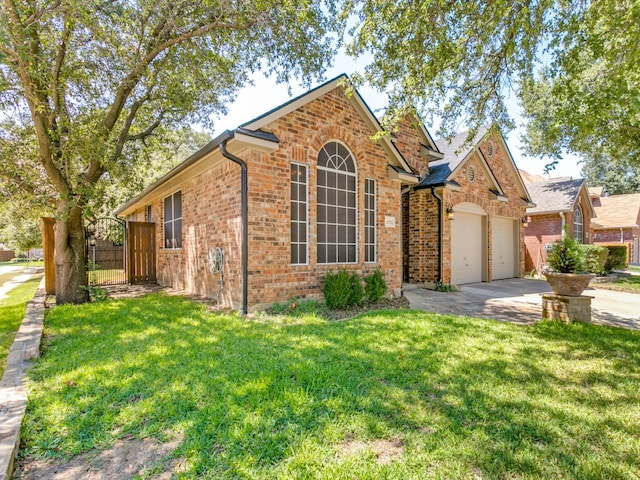 view of front facade featuring a front yard and a garage