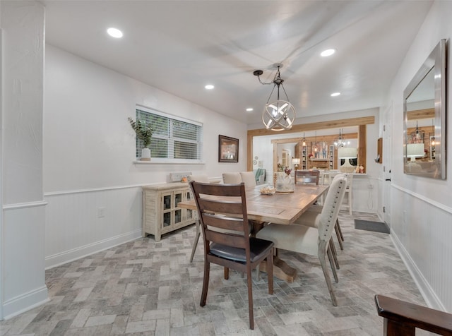 dining room with a notable chandelier