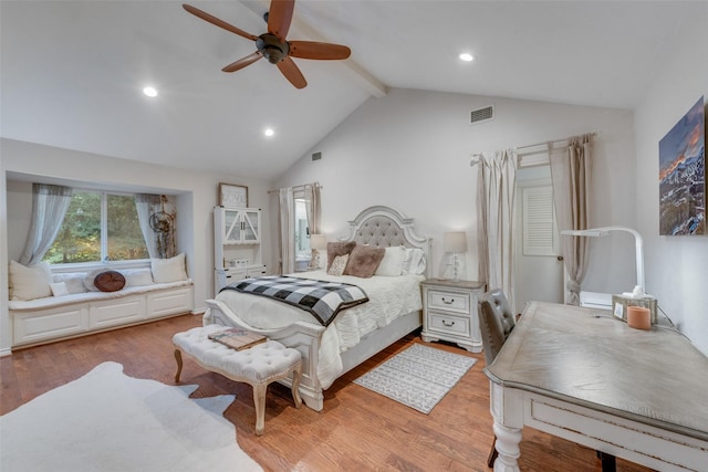 bedroom with ceiling fan, light hardwood / wood-style flooring, beamed ceiling, and high vaulted ceiling