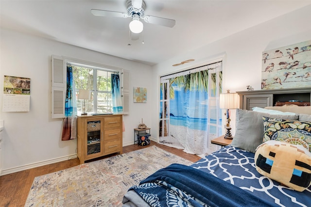 bedroom featuring hardwood / wood-style floors and ceiling fan