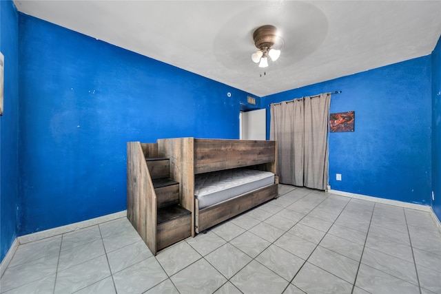 unfurnished bedroom with ceiling fan