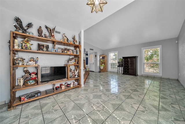 living room with vaulted ceiling