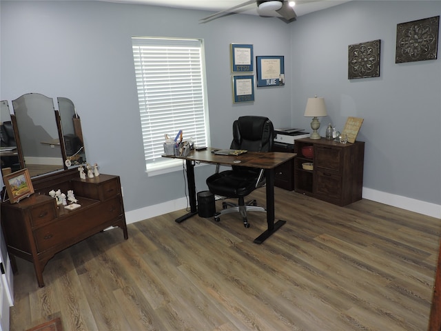 office area featuring ceiling fan and dark hardwood / wood-style floors