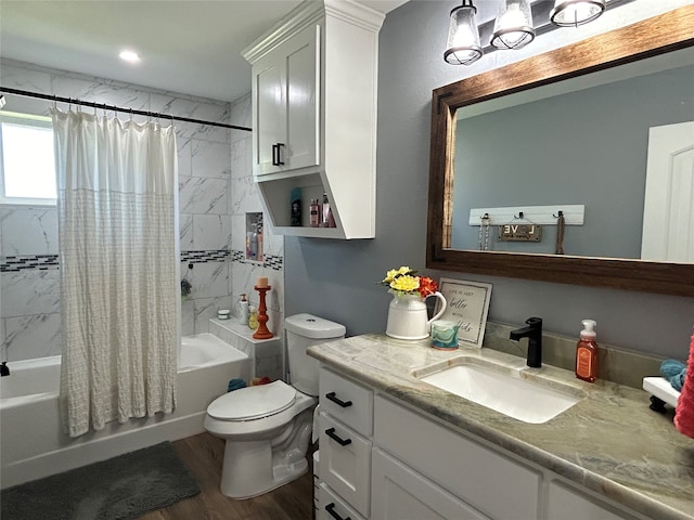 full bathroom featuring vanity, toilet, hardwood / wood-style flooring, and shower / tub combo with curtain