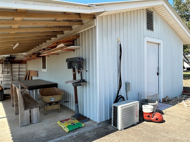 view of outbuilding with ac unit