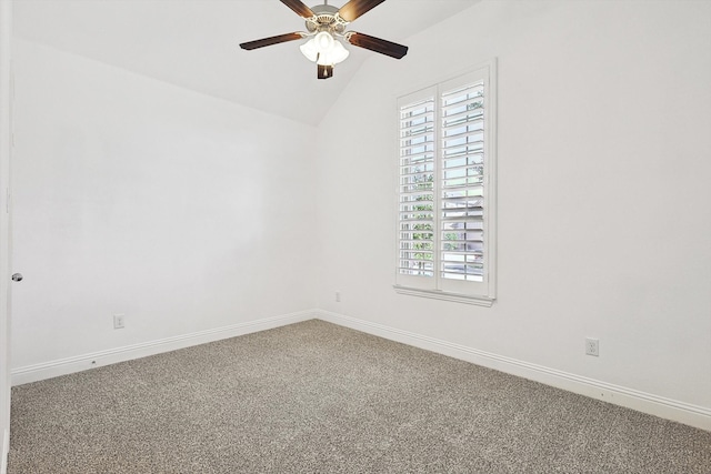 spare room with ceiling fan, carpet floors, and lofted ceiling