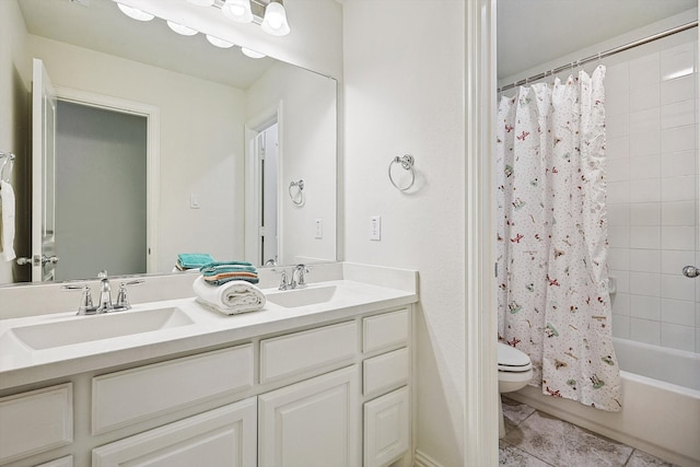 full bathroom featuring vanity, toilet, and shower / tub combo