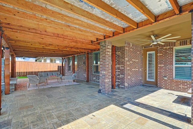 view of patio featuring an outdoor hangout area and ceiling fan