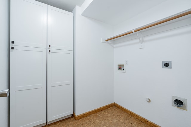 laundry area with washer hookup, cabinets, gas dryer hookup, and hookup for an electric dryer