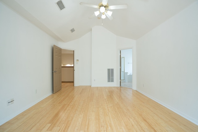 interior space with ceiling fan, vaulted ceiling, and light hardwood / wood-style floors