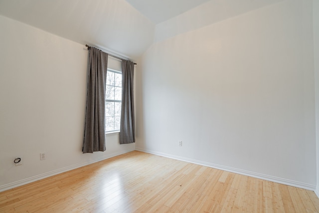 spare room with light wood-type flooring