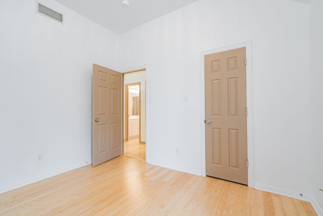 300 Turtle Ct, Mckinney, TX 75072 - empty room featuring visible vents, light wood finished floors, and baseboards