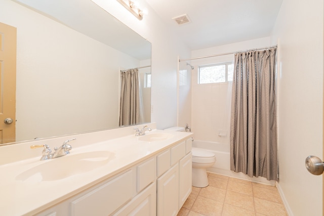 full bathroom with shower / bath combination with curtain, vanity, and toilet